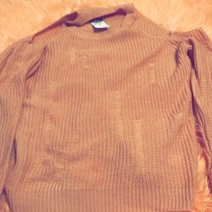 Cute pink sweater slits at top exposing shoulders